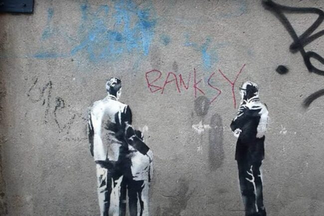 a-fost-dezvaluita-identitatea-lui-bansky.-cine-este-celebrul-artist-stradal-si-cum-l-au-descoperitjurnalistii-de-la-reuters