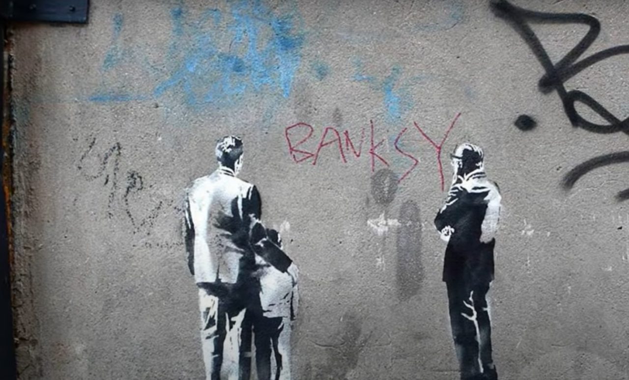 a-fost-dezvaluita-identitatea-lui-bansky.-cine-este-celebrul-artist-stradal-si-cum-l-au-descoperitjurnalistii-de-la-reuters